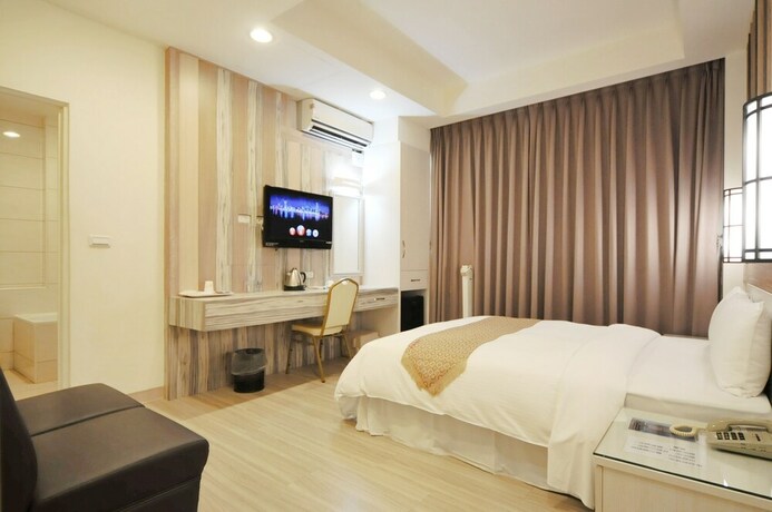 Imagen de la habitación del Hotel Chengdian. Foto 21