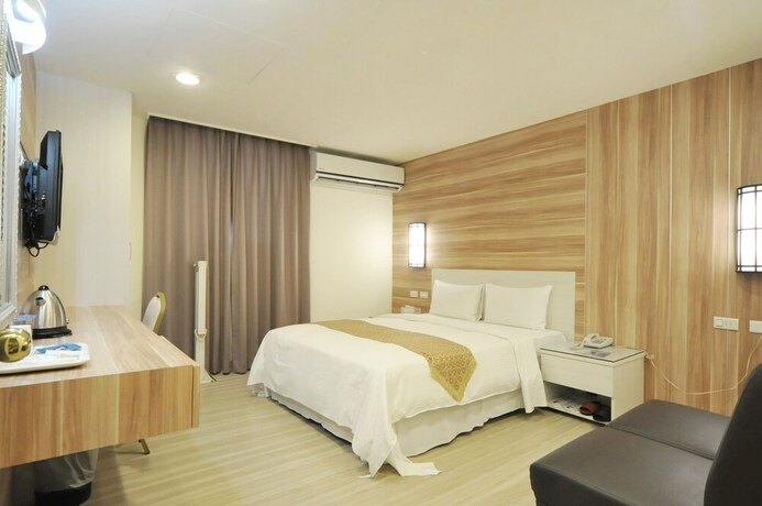 Imagen de la habitación del Hotel Chengdian. Foto 22