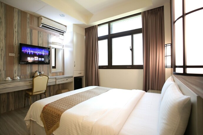 Imagen de la habitación del Hotel Chengdian. Foto 33