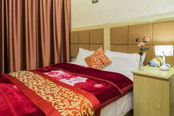 Imagen de la habitación del Hotel Chengdu Azure Apartment. Foto 16