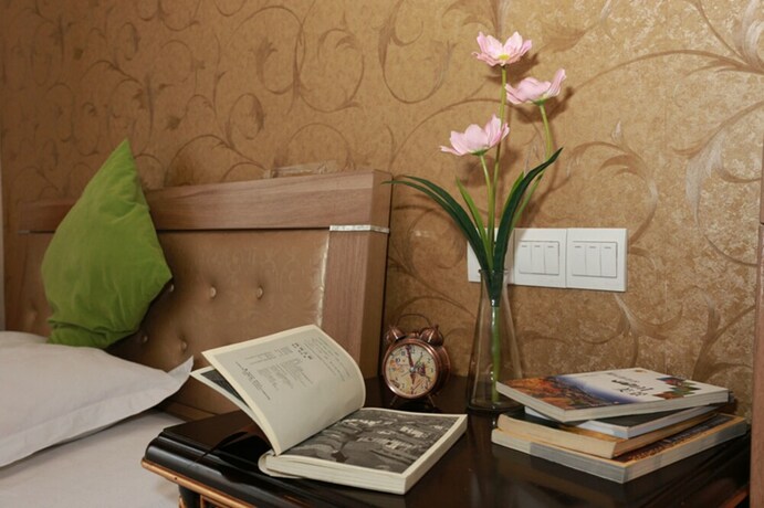 Imagen de la habitación del Hotel Chengdu Azure Apartment. Foto 18