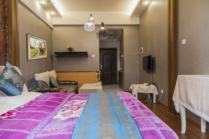 Imagen de la habitación del Hotel Chengdu Azure Apartment. Foto 22