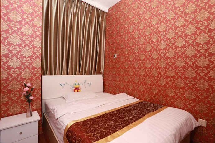 Imagen de la habitación del Hotel Chengdu Azure Apartment. Foto 29