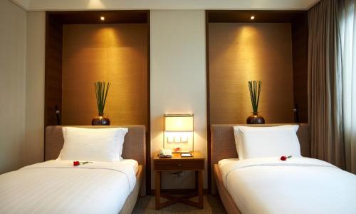 Imagen de la habitación del Hotel Chengdu Harriway. Foto 10