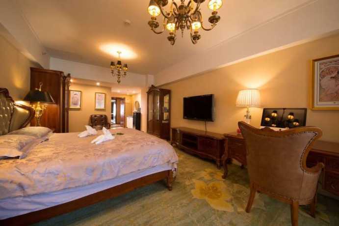 Imagen de la habitación del Hotel Chengdu Longhu Beach Hotel. Foto 2