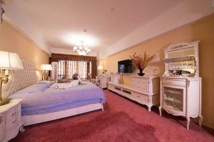 Imagen de la habitación del Hotel Chengdu Longhu Beach Hotel. Foto 3
