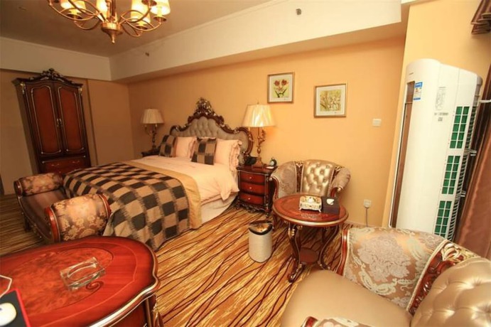 Imagen de la habitación del Hotel Chengdu Longhu Beach Hotel. Foto 5