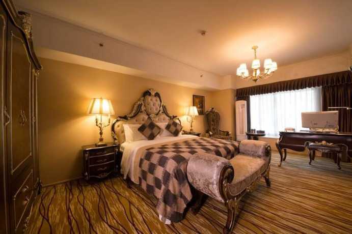 Imagen de la habitación del Hotel Chengdu Longhu Beach Hotel. Foto 6