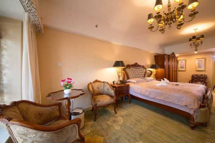 Imagen de la habitación del Hotel Chengdu Longhu Beach Hotel. Foto 9
