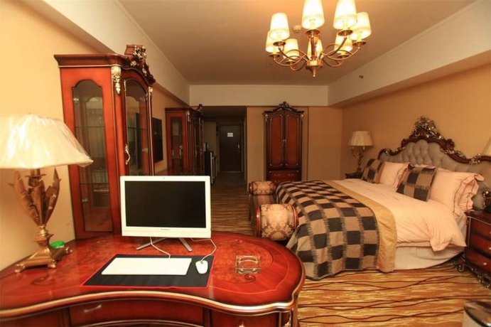 Imagen de la habitación del Hotel Chengdu Longhu Beach Hotel. Foto 11