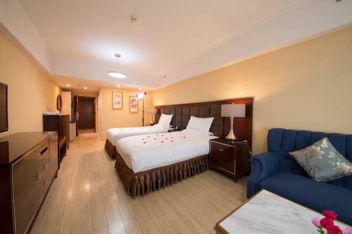 Imagen de la habitación del Hotel Chengdu Longhu Beach Hotel. Foto 13