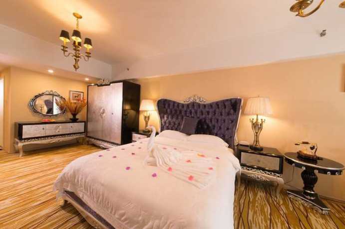 Imagen de la habitación del Hotel Chengdu Longhu Beach Hotel. Foto 14