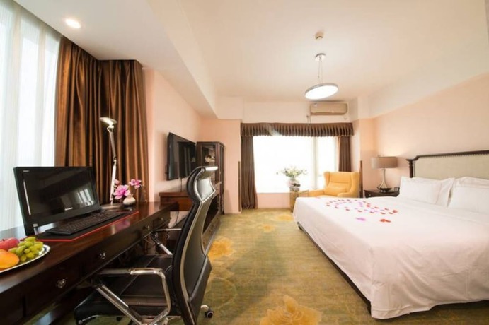 Imagen de la habitación del Hotel Chengdu Longhu Beach Hotel. Foto 15