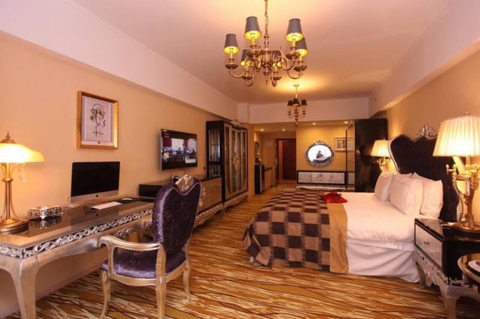 Imagen de la habitación del Hotel Chengdu Longhu Beach Hotel. Foto 16