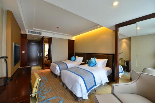 Imagen de la habitación del Hotel Chengdu Rising Butterfly. Foto 4