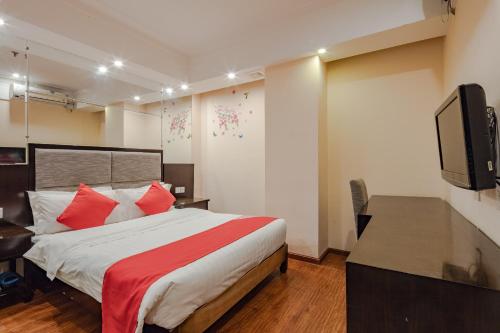 Imagen de la habitación del Hotel Chengdu Sam Cozy. Foto 10