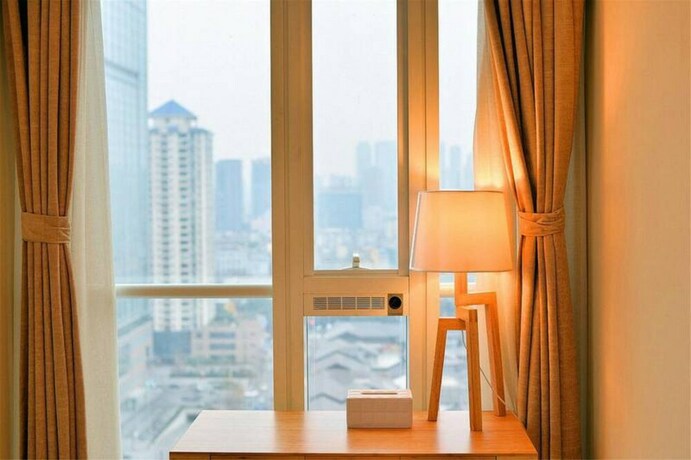 Imagen de la habitación del Hotel Chengdu Summerisland Service Apartment. Foto 21