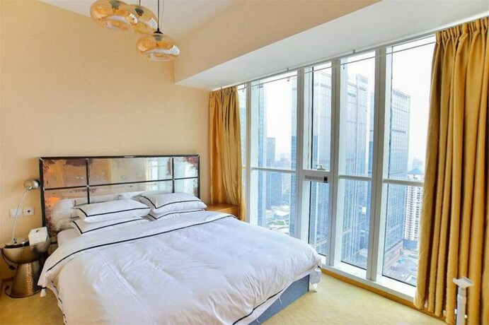 Imagen de la habitación del Hotel Chengdu Summerisland Service Apartment. Foto 24