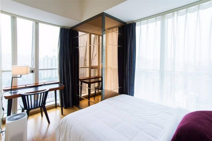 Imagen de la habitación del Hotel Chengdu Summerisland Service Apartment. Foto 26