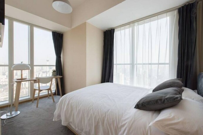 Imagen de la habitación del Hotel Chengdu Summerisland Service Apartment. Foto 28