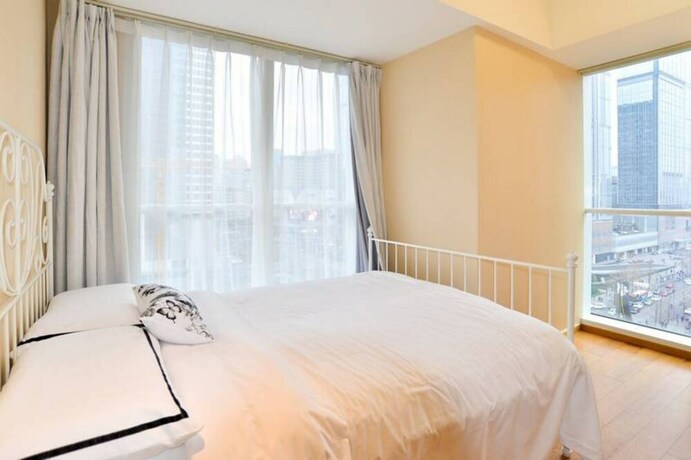 Imagen de la habitación del Hotel Chengdu Summerisland Service Apartment. Foto 29