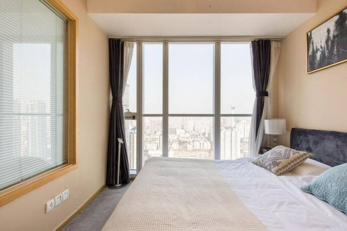 Imagen de la habitación del Hotel Chengdu Summerisland Service Apartment. Foto 30