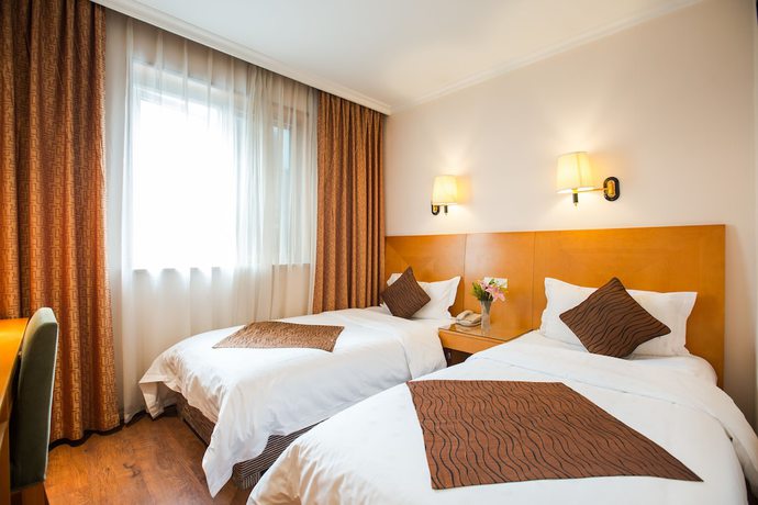 Imagen de la habitación del Hotel Chengdu Taiji Business. Foto 5