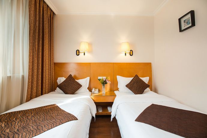 Imagen de la habitación del Hotel Chengdu Taiji Business. Foto 6