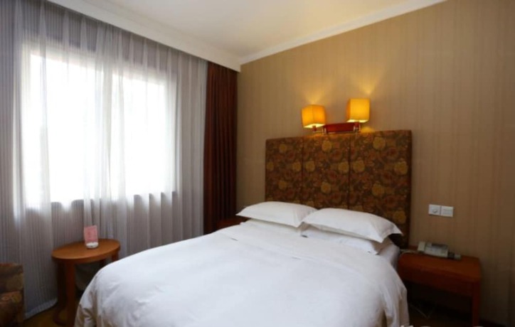 Imagen de la habitación del Hotel Chengdu Tianfu Pretty. Foto 6