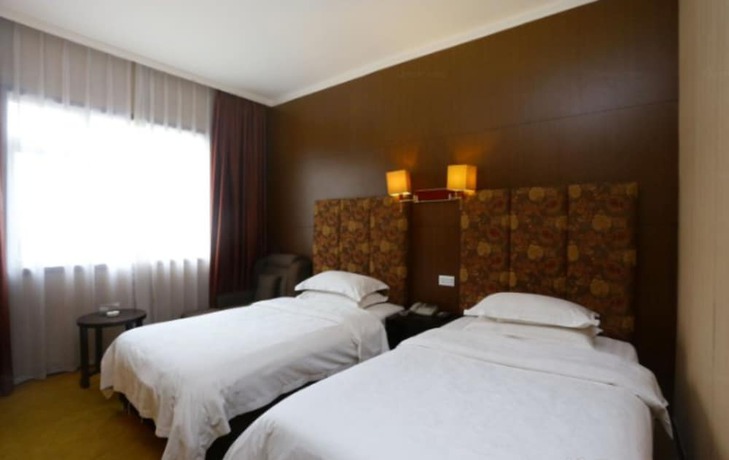 Imagen de la habitación del Hotel Chengdu Tianfu Pretty. Foto 9