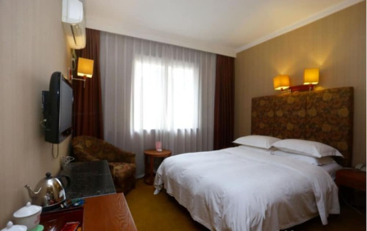 Imagen de la habitación del Hotel Chengdu Tianfu Pretty. Foto 14