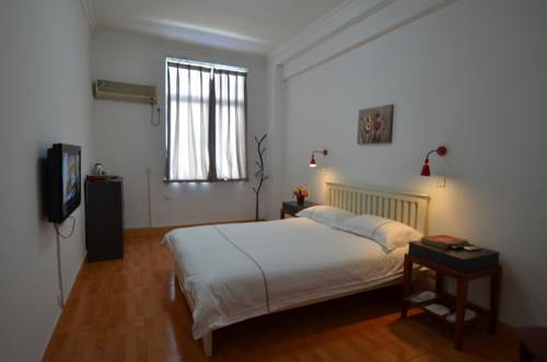 Imagen de la habitación del Hotel Chengdu Traffic. Foto 1