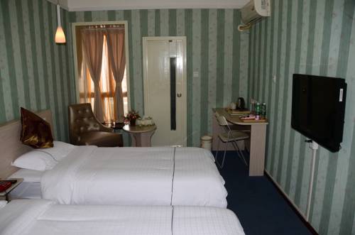 Imagen de la habitación del Hotel Chengdu Traffic. Foto 4
