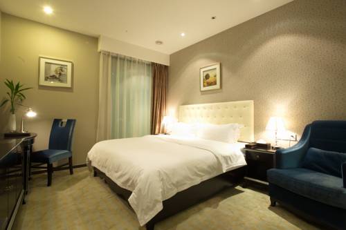 Imagen de la habitación del Hotel Chengdu Xuanya Yingyue. Foto 5