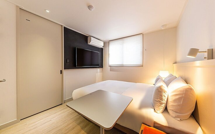 Imagen de la habitación del Hotel Cheonan Camcam. Foto 11