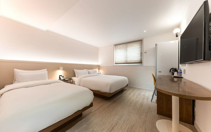 Imagen de la habitación del Hotel Cheonan Camcam. Foto 12