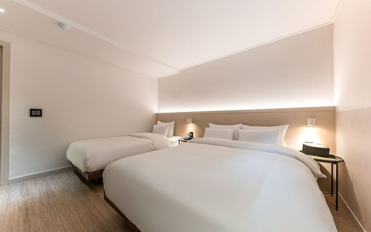 Imagen de la habitación del Hotel Cheonan Camcam. Foto 13