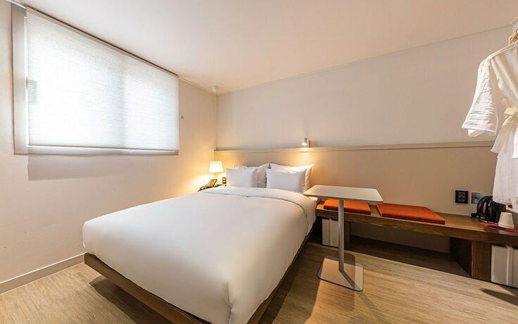 Imagen de la habitación del Hotel Cheonan Camcam. Foto 18