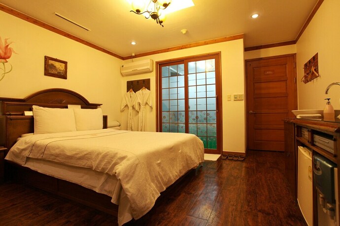 Imagen de la habitación del Hotel Cheonan Cozy Seongjeong. Foto 9