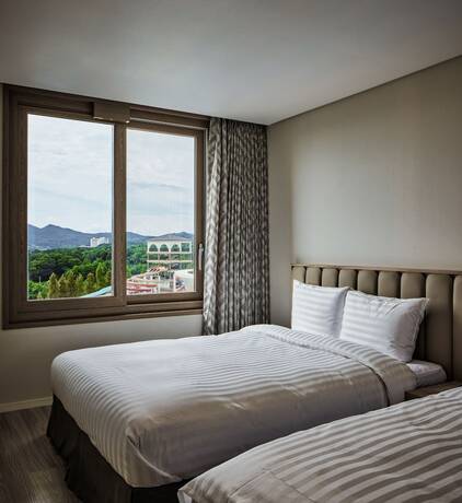 Imagen de la habitación del Hotel Cheonan Daemyung Resort. Foto 22