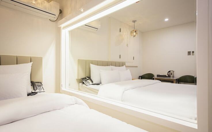 Imagen de la habitación del Hotel Cheonan Honeymoon Motel. Foto 19