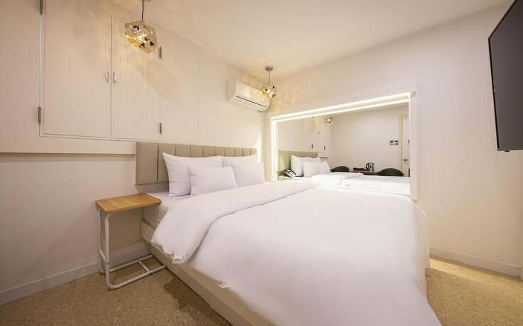 Imagen de la habitación del Hotel Cheonan Honeymoon Motel. Foto 20