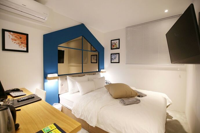 Imagen de la habitación del Hotel Cheonan NU. Foto 13