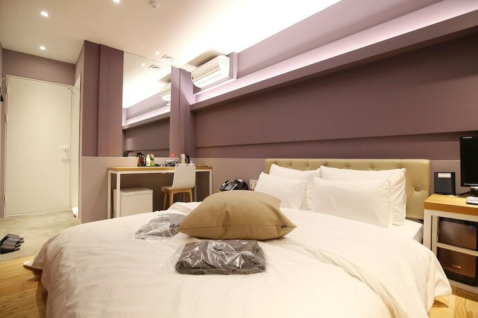 Imagen de la habitación del Hotel Cheonan NU. Foto 17