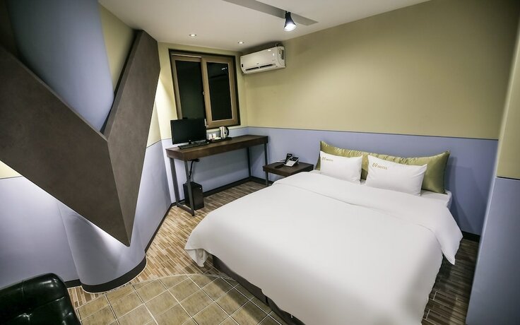 Imagen de la habitación del Hotel Cheongju 69. Foto 11