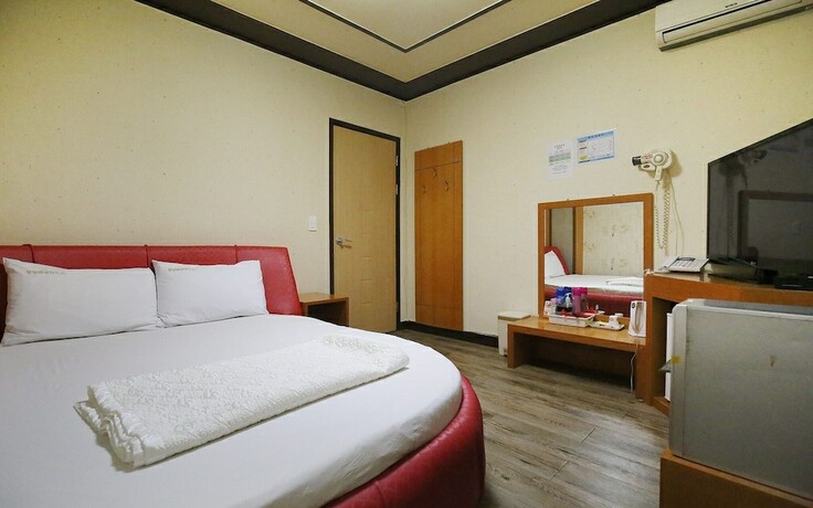 Imagen de la habitación del Hotel Cheongyang Paradise. Foto 16