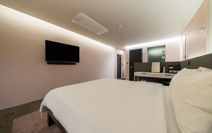 Imagen de la habitación del Hotel Cheonho H. Foto 11