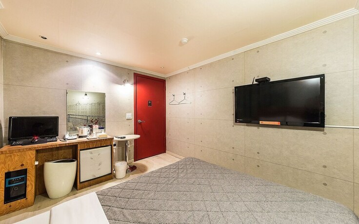 Imagen de la habitación del Hotel Cheonho Orange. Foto 17