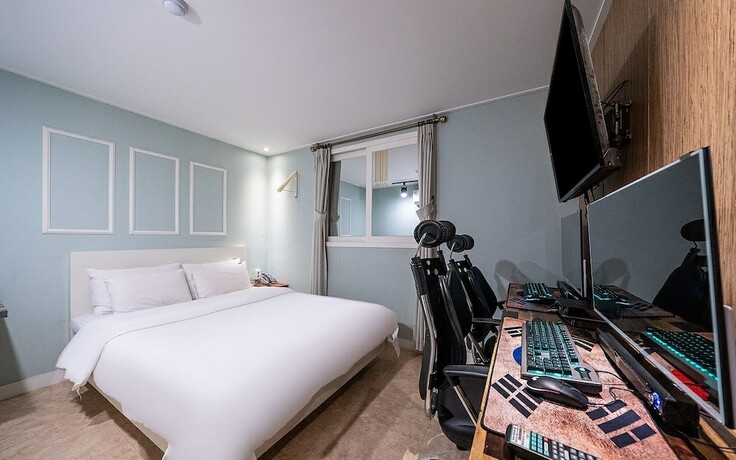 Imagen de la habitación del Hotel Cheonho Seven. Foto 19
