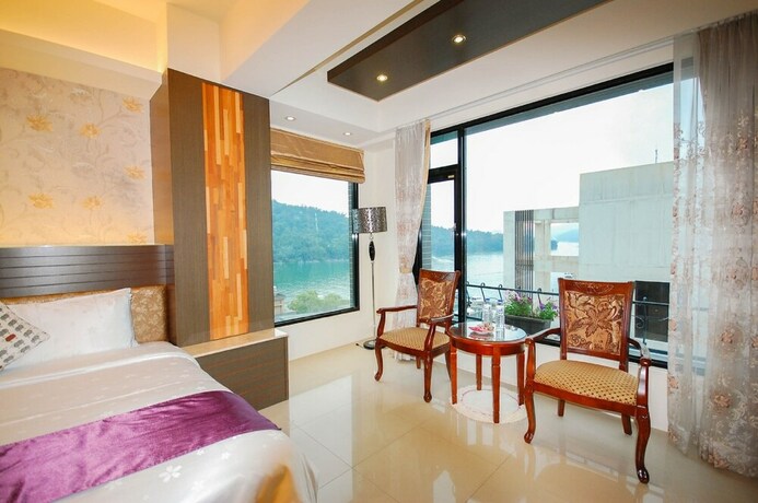 Imagen de la habitación del Hotel Cherry Feast Resort. Foto 17